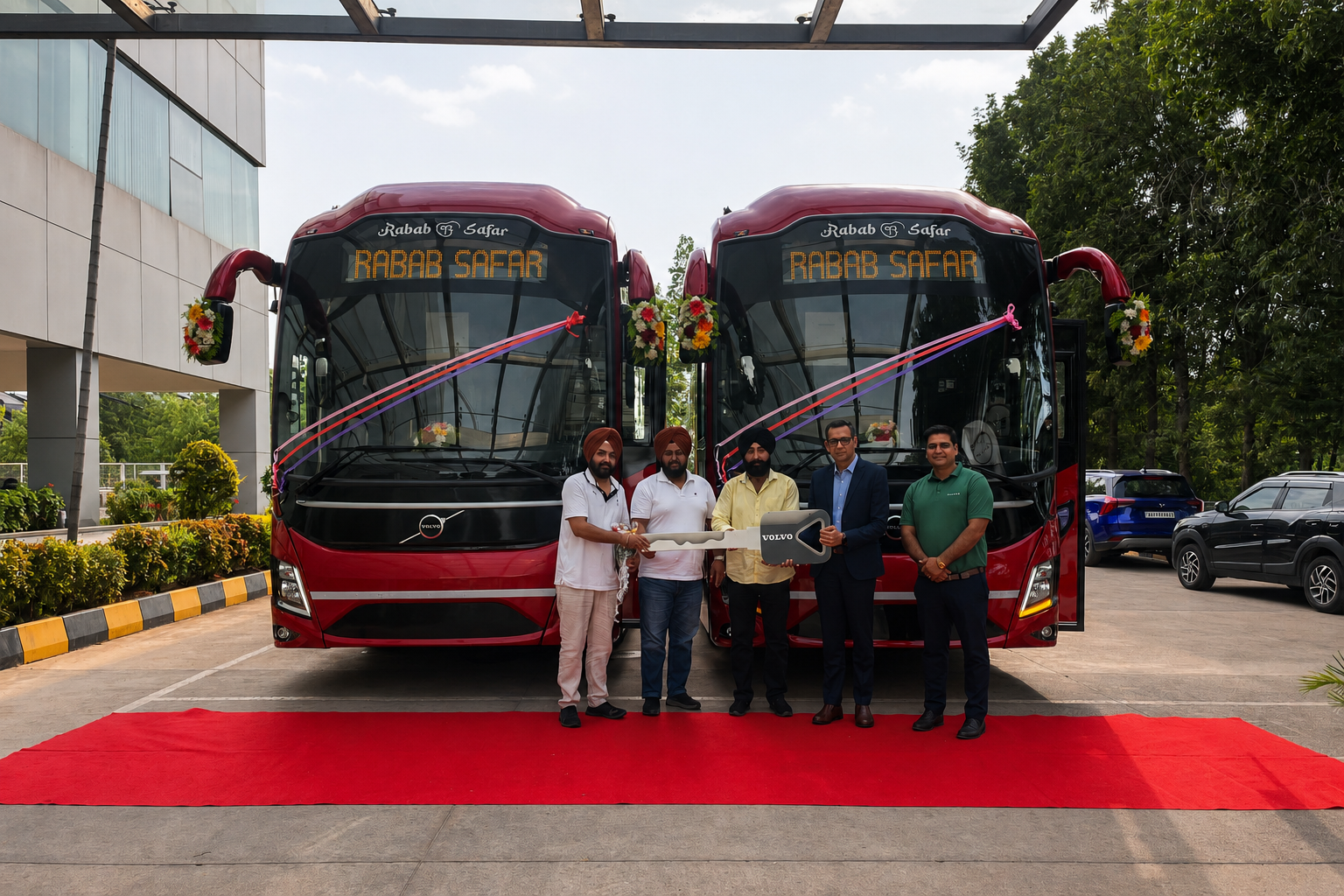 Rabab Safar Owner & Team receiving official bus key from Volvo